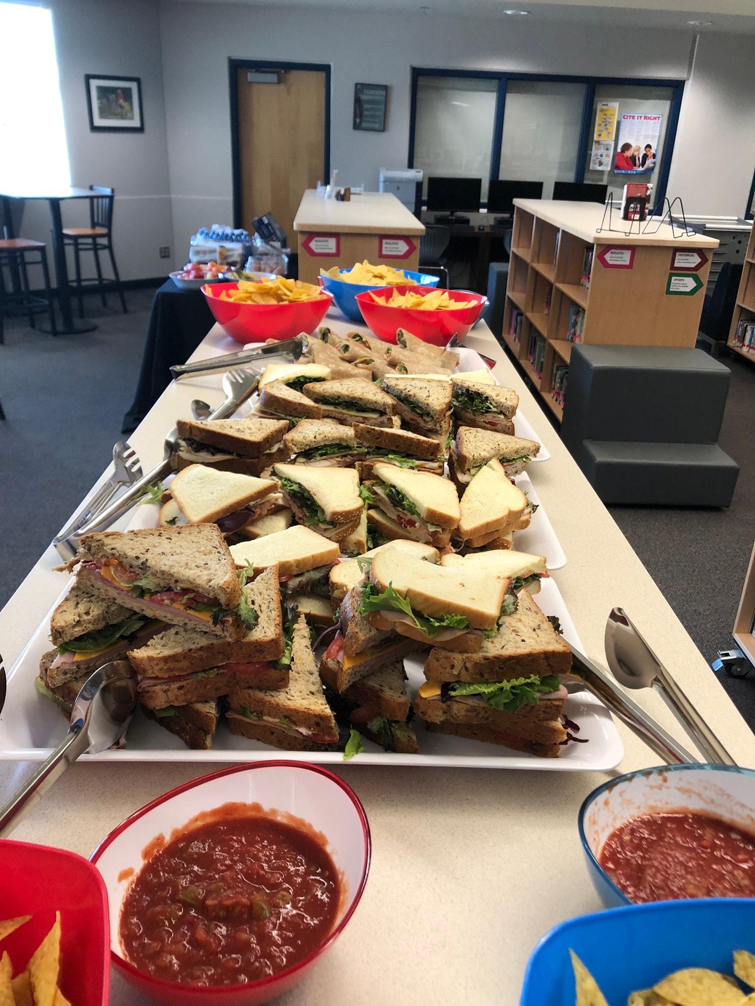 Catered sandwich spread in office setting